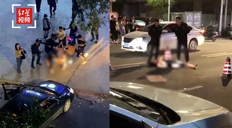 广西街头遭群人围殴轿车碾压