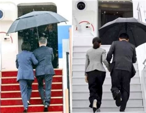 韩国总统雨中撑伞