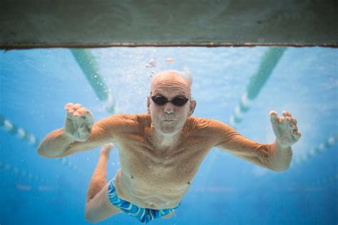 old man swimming